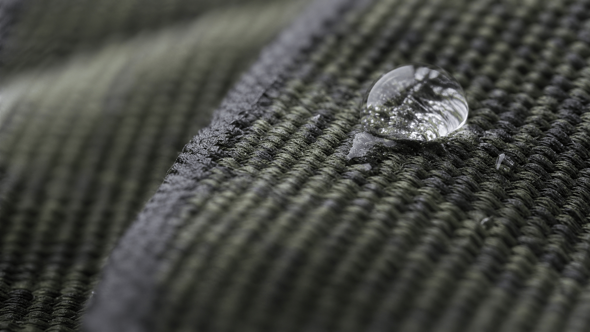 Macro fiber shot - moss green charcoal technical weave